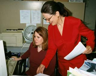 Anne and Blair at work.